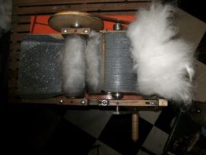 removing the dog hair fiber from the drum carder